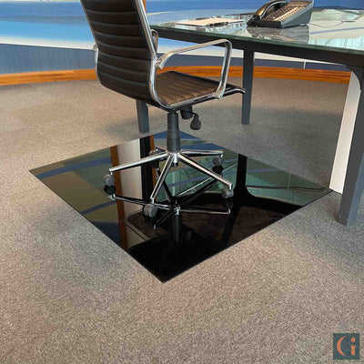 Toughened Glass Chair Mat, black ceramic glass, 6mm thickness, polished edges. Protect wood, carpet or tile office floor and increase ease of movement on office chair casters. Home office desk essentials. Modern & Contemporary Glass floor mat, furniture and Glass interior products Ireland.