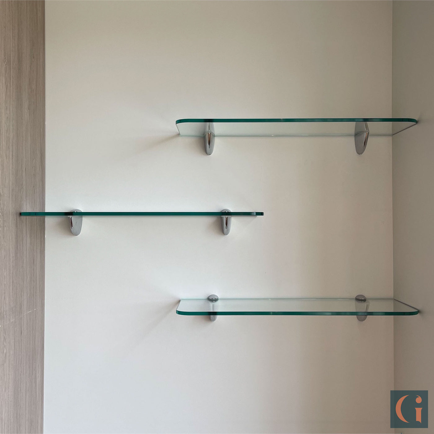 Three wall mounted Toughened & Polished Clear Glass Rectangle Shelf, front radius corners, silver shelf clips. Bathroom, Bedroom, Kitchen, Living Room, Office Shelves. Wall Mounted, Floating Glass Shelf.