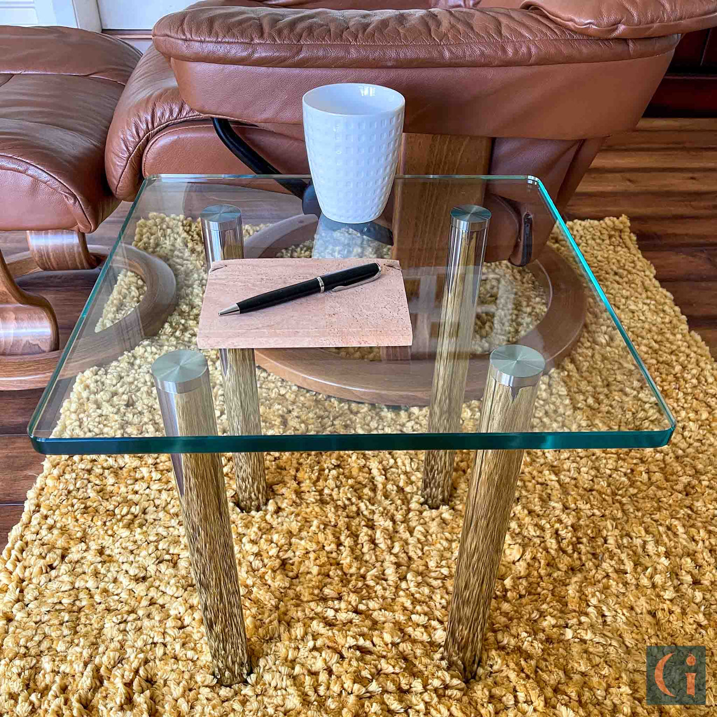 Toughened Clear Glass Side Table, 15mm thickness with polished edges and radius corners. Stainless Steel UV Bonded Table legs. Modern & contemporary glass side table, coffee table, shelves, furniture & interiors products Ireland. 