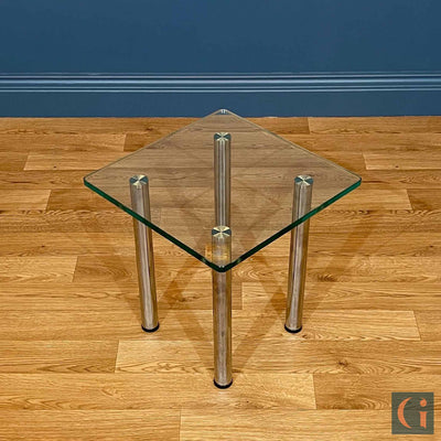 Toughened Clear Glass Side Table, 15mm thickness with polished edges and radius corners. Stainless-Steel UV Bonded Table legs. Modern & contemporary glass side table, coffee table, shelves, furniture & interiors products Ireland.