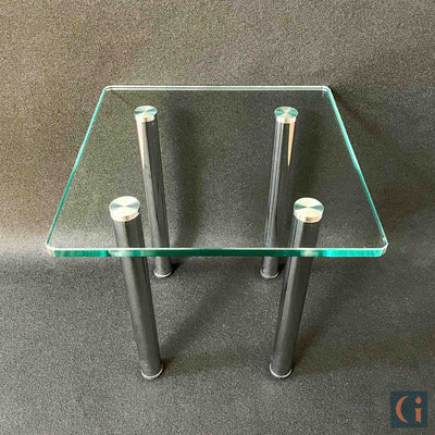 Toughened Clear Glass Side Table, 15mm thickness with polished edges and radius corners. Stainless-Steel UV Bonded Table legs. Modern & contemporary glass side table, coffee table, shelves, furniture & interiors products Ireland.