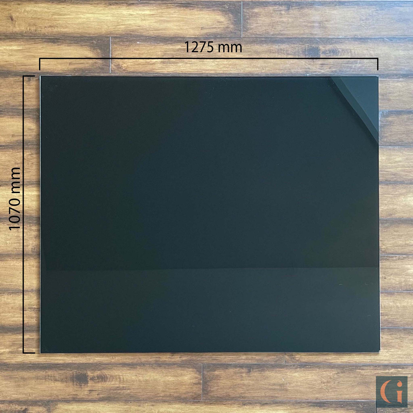 1275x1070mm Toughened Glass Chair Mat, black ceramic glass, 6mm thickness, polished edges. Protect wood, carpet or tile office floor and increase ease of movement on office chair casters. Home office desk essentials. Modern & Contemporary Glass floor mat, furniture and Glass interior products Ireland.