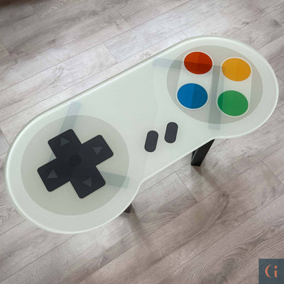 Digitally Printed Toughened Glass Game Controller Design Table top with powder coated steel table base. Modern & colourful coffee table design. Contemporary Glass tables, shelves, furniture & interior products Ireland.