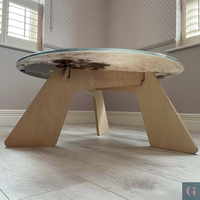 Front view of Moon Design Digitally Printed Toughened Glass Circle Coffee Table top with powder coated steel table base. Modern & colourful coffee table design. Contemporary Glass tables, shelves, furniture & interior products Ireland.