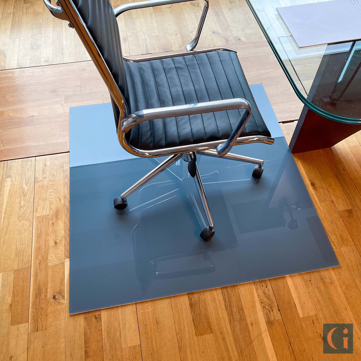 Toughened Glass Chair Mat, grey ceramic glass, 6mm thickness, polished edges. Protect wood, carpet or tile office floor and increase ease of movement on office chair casters. Home office desk essentials. Modern & Contemporary Glass floor mat, furniture and Glass interior products Ireland.