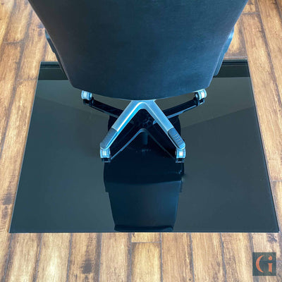 Toughened Glass Chair Mat, black ceramic glass, 6mm thickness, polished edges. Protect wood, carpet or tile office floor and increase ease of movement on office chair casters. Home office desk essentials. Modern & Contemporary Glass floor mat, furniture and Glass interior products Ireland.