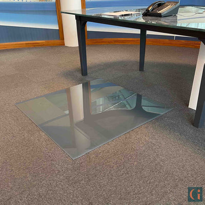 Toughened Glass Chair Mat, grey ceramic glass, 6mm thickness, polished edges. Protect wood, carpet or tile office floor and increase ease of movement on office chair casters. Home office desk essentials. Modern & Contemporary Glass floor mat, furniture and Glass interior products Ireland.  