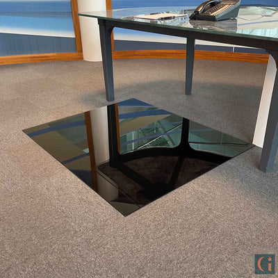 Toughened Glass Chair Mat, black ceramic glass, 6mm thickness, polished edges. Protect wood, carpet or tile office floor and increase ease of movement on office chair casters. Home office desk essentials. Modern & Contemporary Glass floor mat, furniture and Glass interior products Ireland.