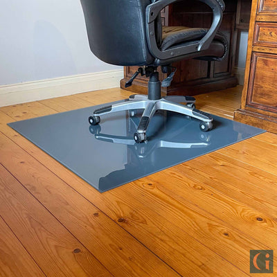 Toughened Glass Chair Mat, grey ceramic glass, 6mm thickness, polished edges. Protect wood, carpet or tile office floor and increase ease of movement on office chair casters. Home office desk essentials. Modern & Contemporary Glass floor mat, furniture and Glass interior products Ireland.